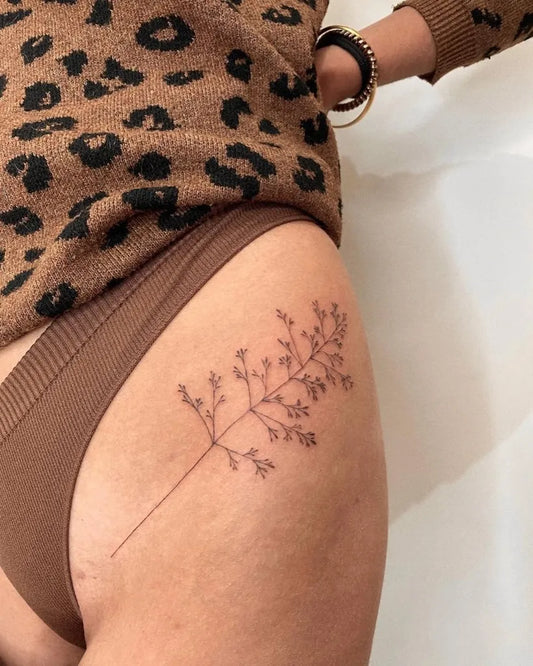 Small Fine Line Baby Breath Tattoo on Women Hip by @edithjea