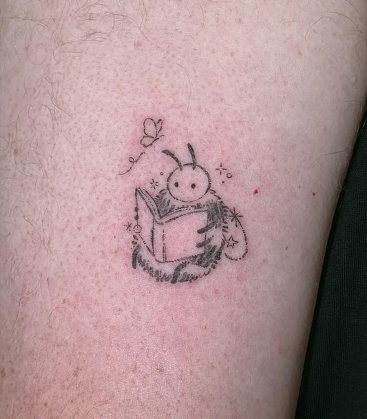 Small Fine Line Bee Reading Book on Women Arm Tattoo by @tinybaki