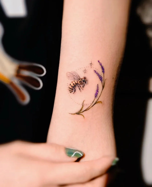 Small Fine Line Bee and Lavender on Women Arm Tattoo by @mariadelmar.tattoo
