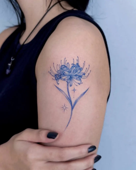 Small Fine Line Blue Spider Lily with Stars Tattoo on Women Shoulder by @tattooist_taker