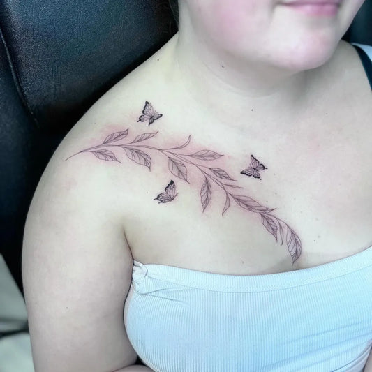 Small Fine Line Butterflies and Leaves Tattoo on Women Collarbone by @kay_tattoos