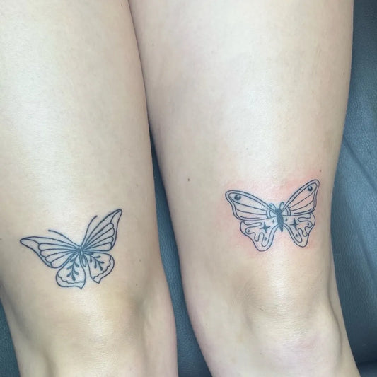 Small Fine Line Butterfly Tattoo on Women Knee by @bratty_tattoos