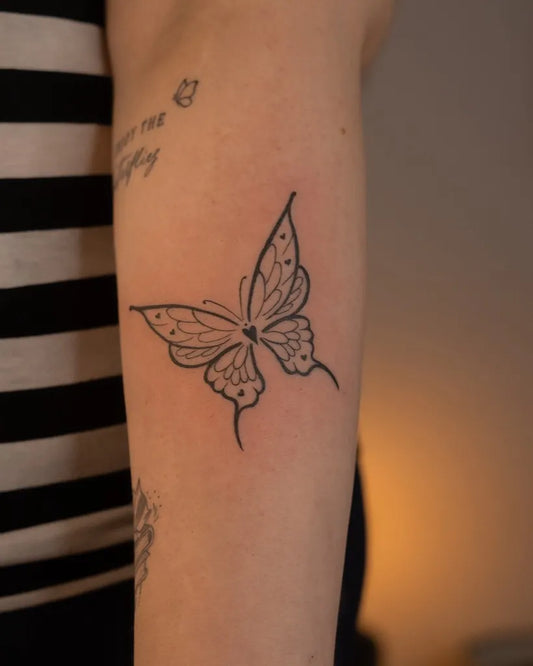 Small Fine Line Butterfly on Women Forearm Tattoo by @elizabalasa