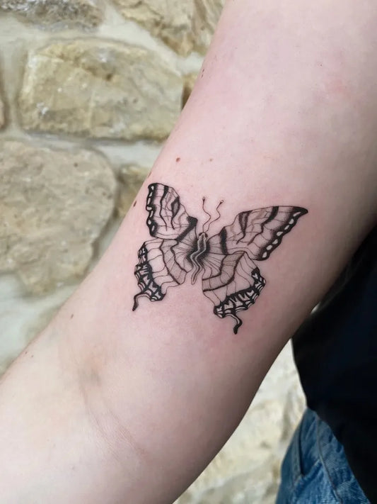 Small Fine Line Butterfly on Women Forearm Tattoo by @heloisegeslain