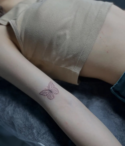 Small Fine Line Butterfly on Women Inner Arm Tattoo by @diyartattoo