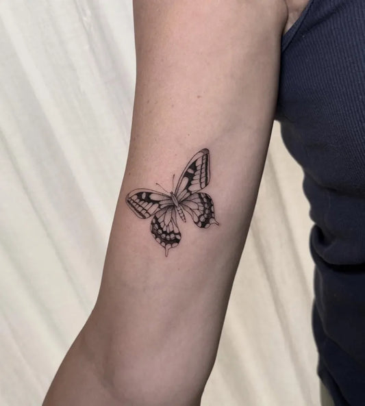 Small Fine Line Butterfly on Women Upper Arm Tattoo by @silviainkocciati