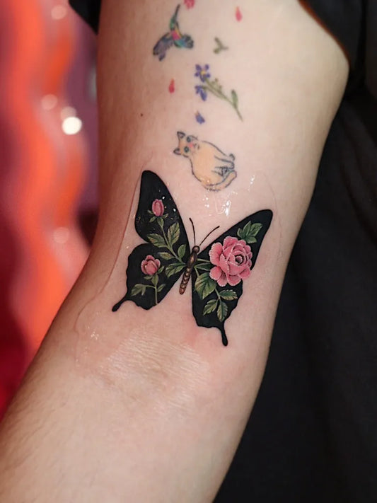 Small Fine Line Butterfly with Roses on Women Upper Arm Tattoo by @heart.haney