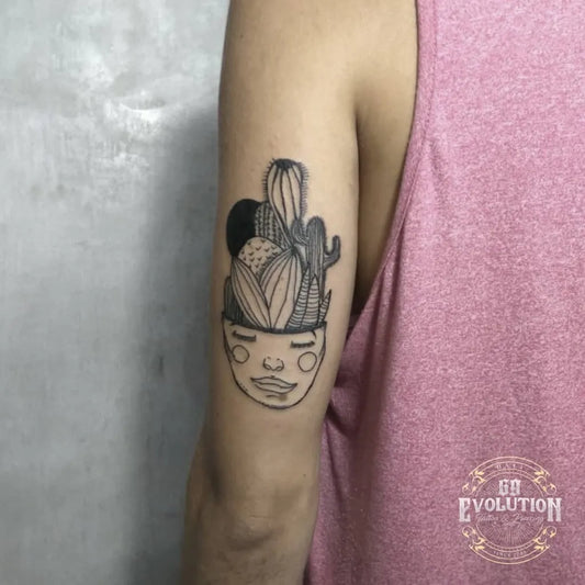 Small Fine Line Cactus Head Tattoo on Women Arm by @69_evolution_tattoo