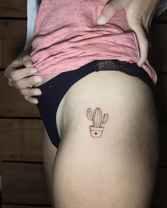 Small Fine Line Cactus in Pot Tattoo on Women Thigh by @yantinotattoo_ubud