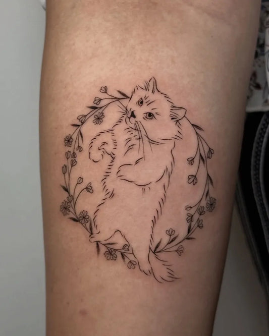 Small Fine Line Cat and Flowers Tattoo on Women Arm by @amberproject.ph