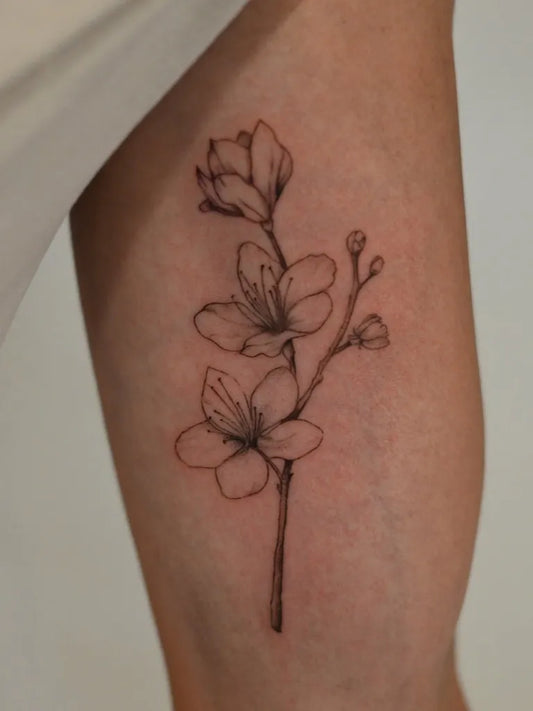 Small Fine Line Cherry Blossom Branch on Women Arm Tattoo by @powshh