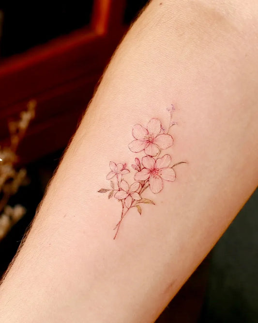 Small Fine Line Cherry Blossom Branch on Women Arm Tattoo by @tattooistflower_mood