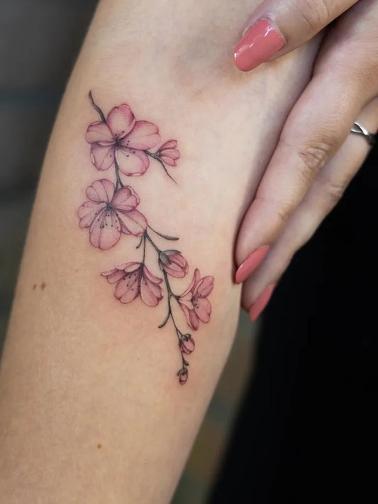 Small Fine Line Cherry Blossom Branch on Women Forearm Tattoo by @marbotanica