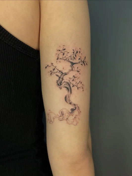 Small Fine Line Cherry Blossom Tree Tattoo on Women Arm by @harmlesskittytattoo