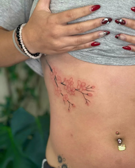 Small Fine Line Cherry Blossom on Women Rib Tattoo by @gooseinks