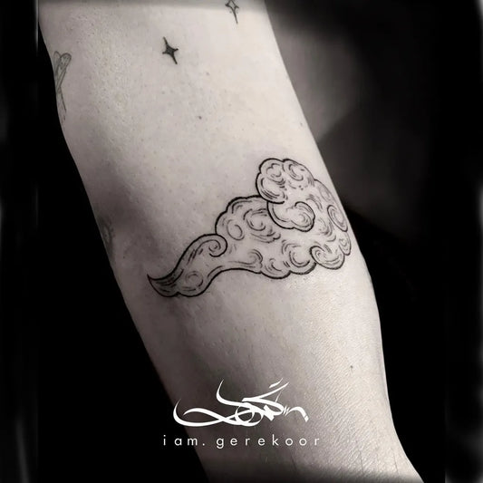 Small Fine Line Cloud Tattoo on Women Arm by @iam.real.og