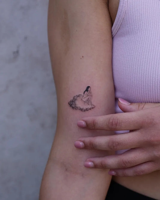 Small Fine Line Cloud Tattoo on Women Arm by @mickey.ontheclouds