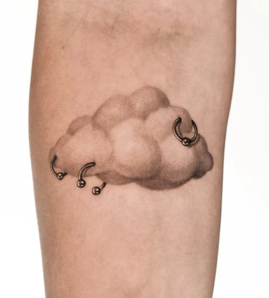 Small Fine Line Cloud with Hoops Tattoo on Women Arm by @gida_tattoo_tlv