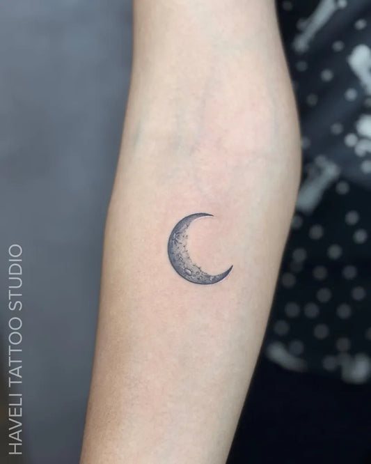 Small Fine Line Crescent Moon Tattoo on Women Arm by @havelitattoo