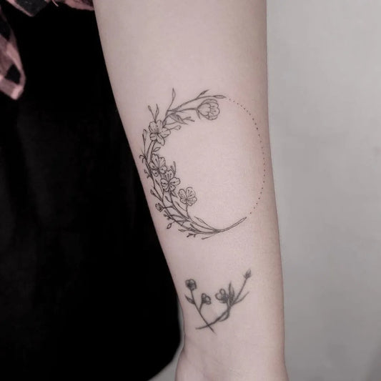 Small Fine Line Crescent Moon and Flowers Tattoo on Women Arm by @jello_t