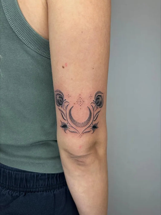 Small Fine Line Crescent Moon and Roses Tattoo on Women Arm by @valvntin