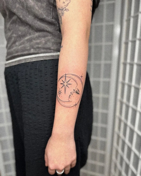 Small Fine Line Crescent Moon and Star Tattoo on Women Arm by @mollypaigetattoos