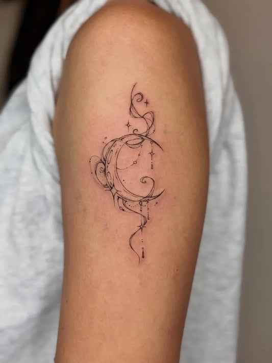 Small Fine Line Crescent Moon and Swirls Tattoo on Women Shoulder by @qiongyu_art