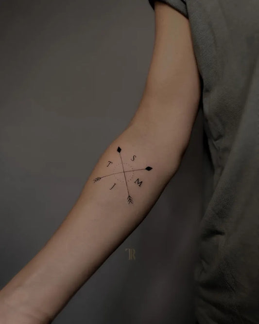 Small Fine Line Crossed Initials Family Tattoo on Women Arm by @tattoobyregino