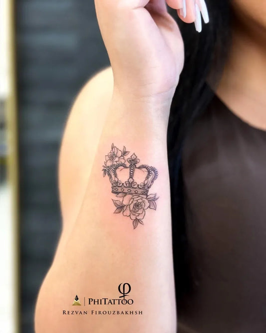 Small Fine Line Crown and Rose Tattoo on Women Wrist by @tattoobyrez