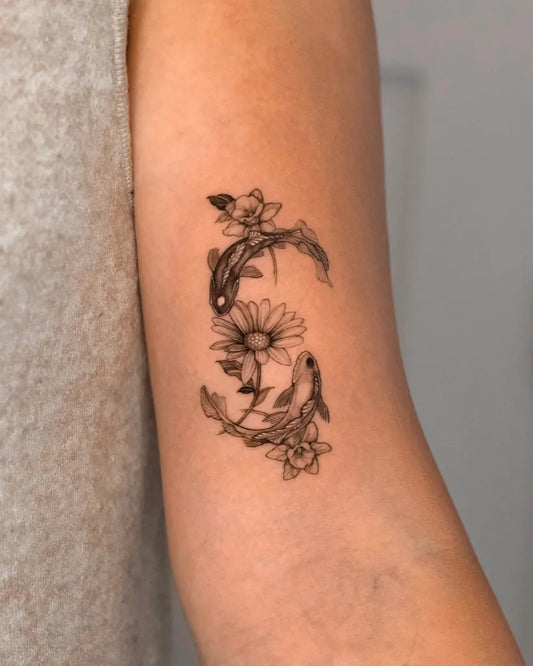 Small Fine Line Daffodil Koi Tattoo on Women Arm by @vanya.ink