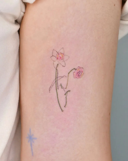 Small Fine Line Daffodil and Rose Tattoo on Women Arm by @ihwatattoo