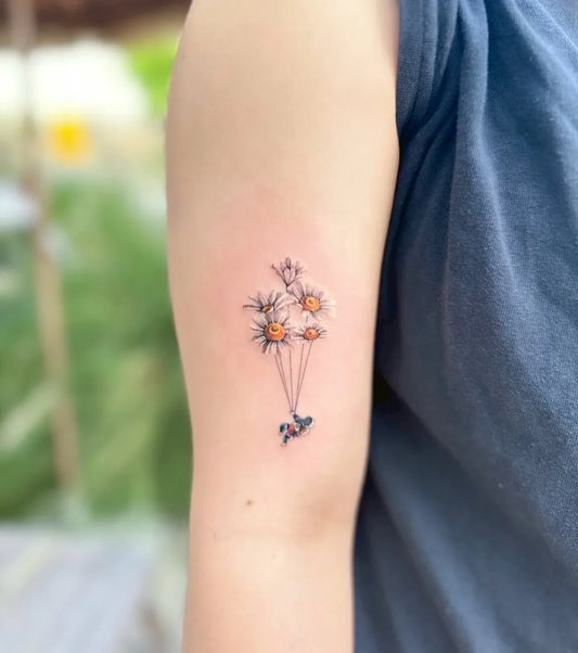 Small Fine Line Daisy Balloons Tattoo on Women Arm by @mood_bkk