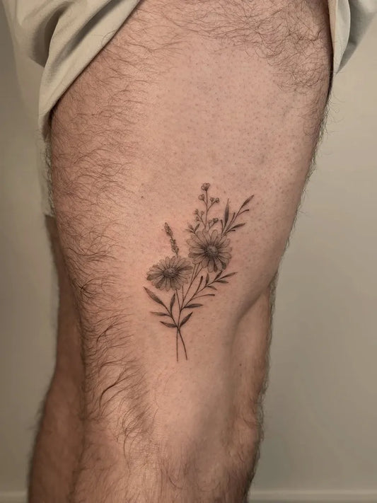 Small Fine Line Daisy Flowers Tattoo on Men Thigh by @tattoobychang