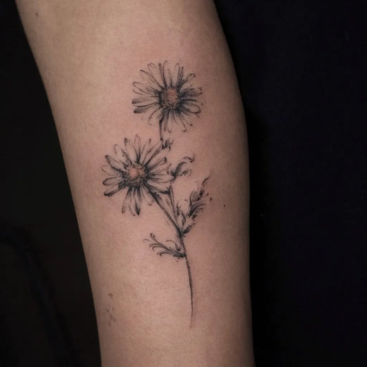 Small Fine Line Daisy Flowers Tattoo on Women Forearm by @boom.jrn