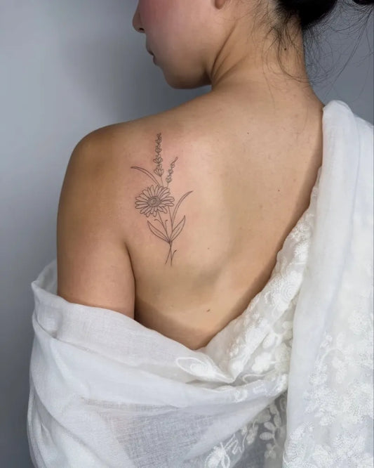 Small Fine Line Daisy Flowers Tattoo on Women Shoulder by @francielitattooart