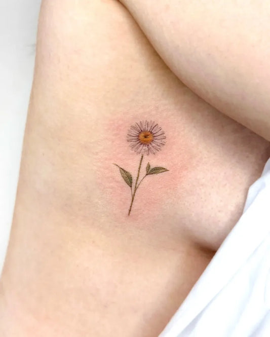 Small Fine Line Daisy Tattoo on Women Arm by @eontattoo