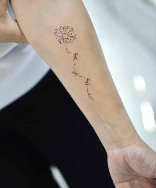Small Fine Line Daisy and Names Tattoo on Women Arm by @baronart_helen
