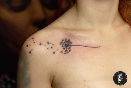 Small Fine Line Dandelion Seeds Tattoo on Women Shoulder by @tattoo_art_picasso
