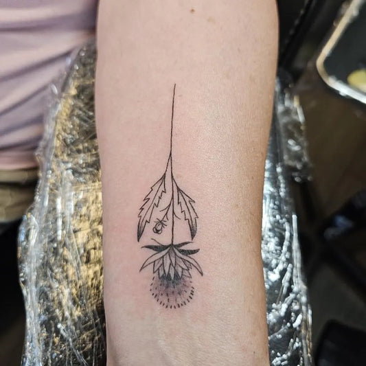 Small Fine Line Dandelion Tattoo on Women Forearm by @angryowltattoo