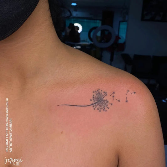 Small Fine Line Dandelion and Constellation Tattoo on Women Shoulder by @irezumitattoosindia