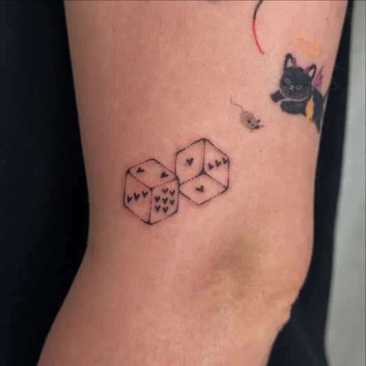 Small Fine Line Dice and Cat and Mouse Tattoo on Women Knee by @clara.tats