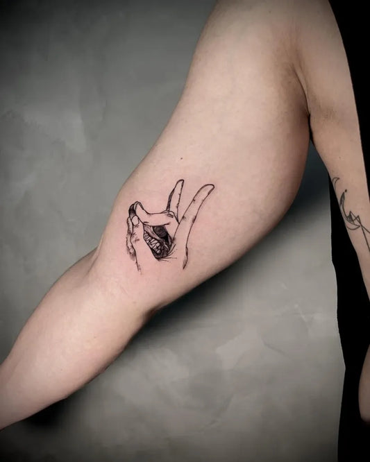 Small Fine Line Dog Hand Tattoo on Women Arm by @manassestattoo
