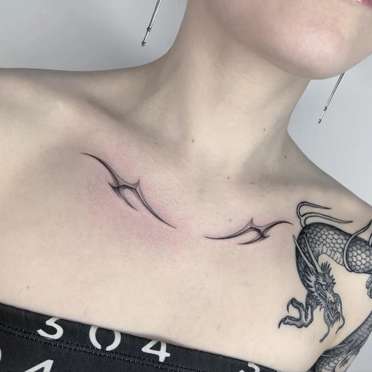 Small Fine Line Dragon and Tribal Tattoo on Women Collarbone by @fresh_flower__