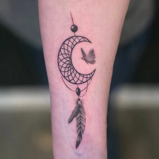 Small Fine Line Dream Catcher Tattoo on Women Forearm by @tabby_cat_tat