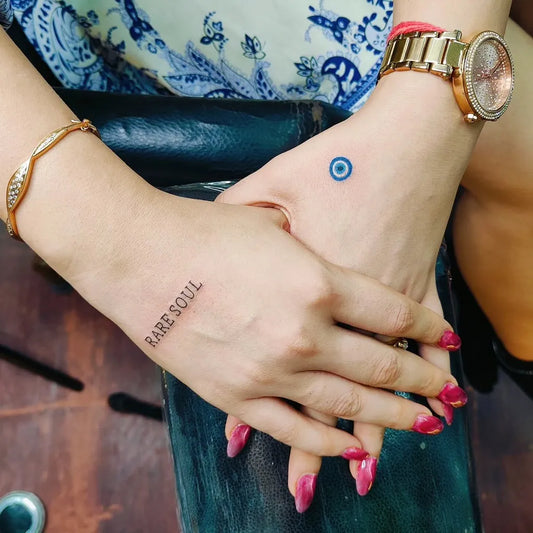 Small Fine Line Evil Eye BARE SOUL on Women Wrist Tattoo by @aurainkandtipsbyus
