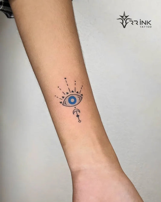 Small Fine Line Evil Eye on Women Wrist Tattoo by @rr_ink_tattoo_cherpulassery