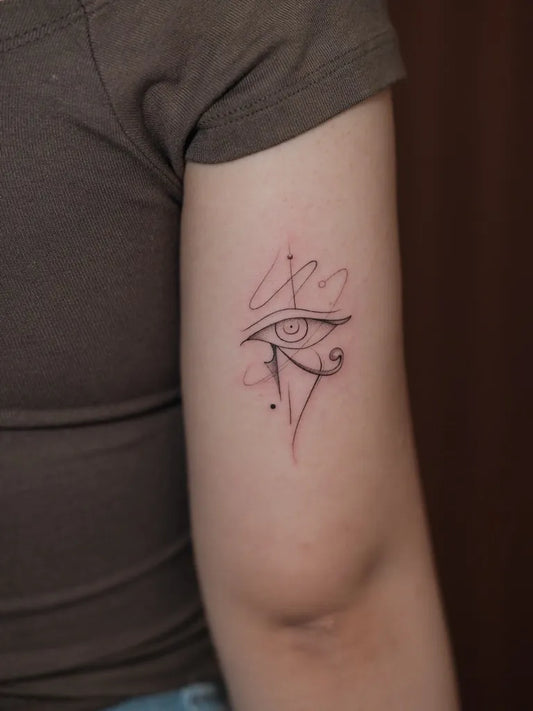 Small Fine Line Eye of Horus Tattoo on Women Arm by @demon.tatts