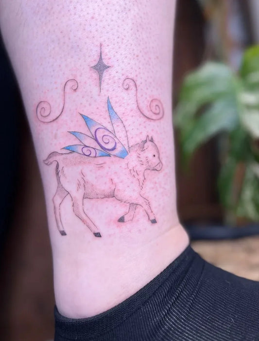 Small Fine Line Fairy Lamb Nature Tattoo on Women Ankle by @froglounge