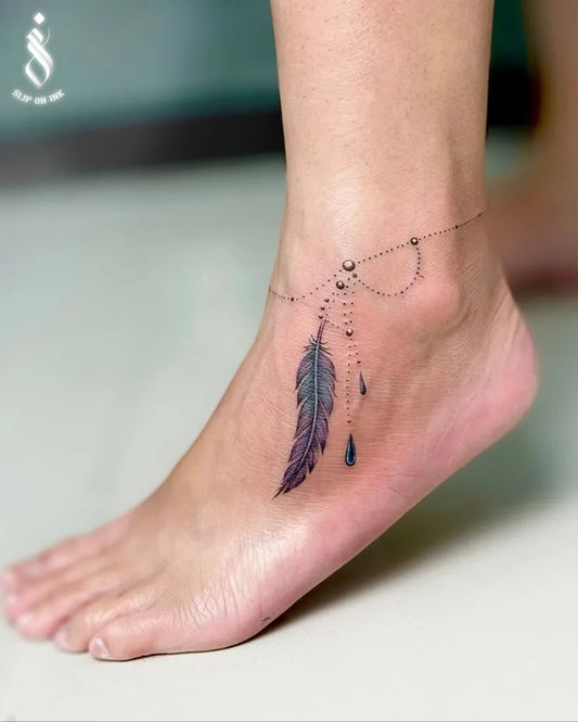 Small Fine Line Feather Anklet Tattoo on Women Ankle by @sliponink