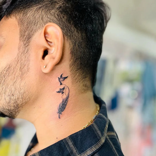 Small Fine Line Feather and Birds Tattoo on Men Neck by @the_tattoo_club_78